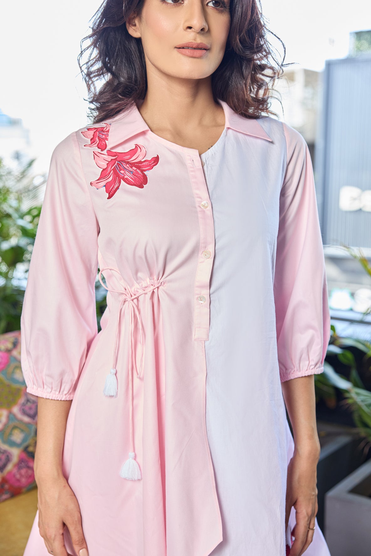 pink and white assymmetric shirt with tie-up
